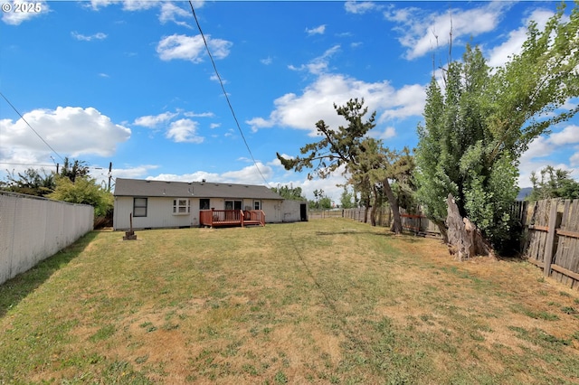 695 32nd St, Springfield, OR 97478 - fenced backyard featuring a wooden deck