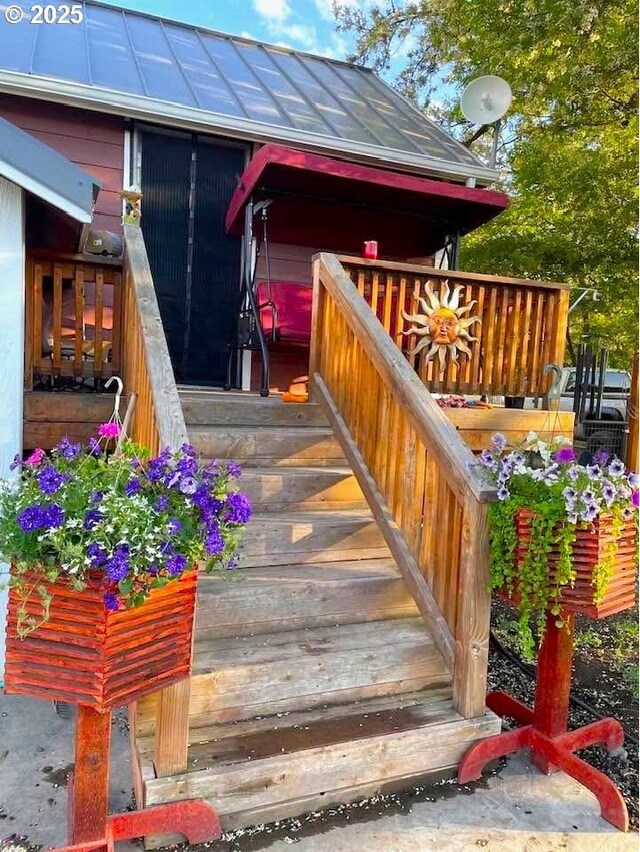 entrance to property with a standing seam roof and metal roof