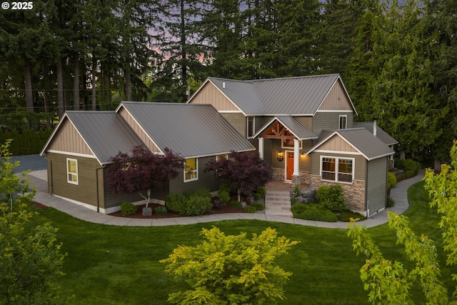 15780 SE 329th Ave, Boring, OR 97009 - craftsman-style home with metal roof, a front yard, stone siding, and a standing seam roof