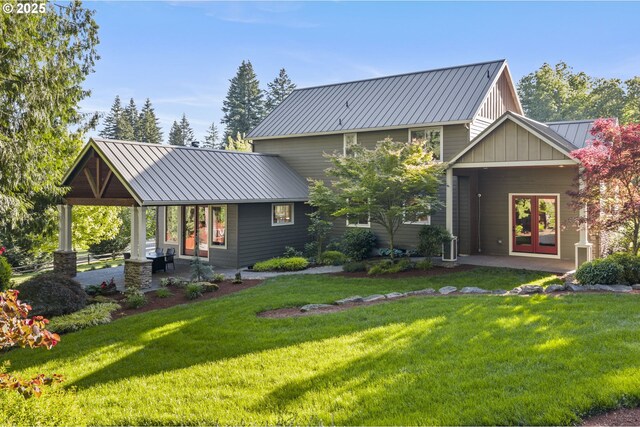 15780 SE 329th Ave, Boring, OR 97009 - rear view of house featuring french doors, a lawn, metal roof, and board and batten siding
