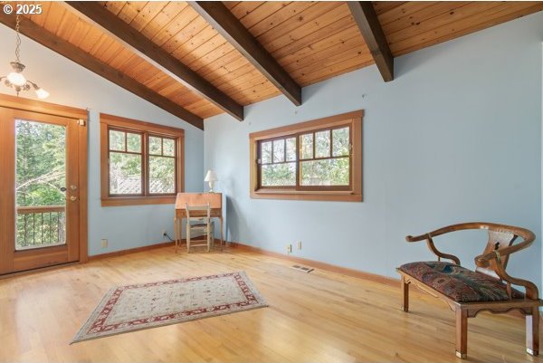 86595 N Modesto Dr, Eugene, OR 97402 - sitting room with wooden ceiling, wood finished floors, and baseboards