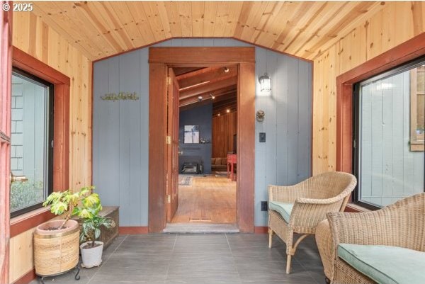 86595 N Modesto Dr, Eugene, OR 97402 - lobby with vaulted ceiling, wooden walls, and wooden ceiling