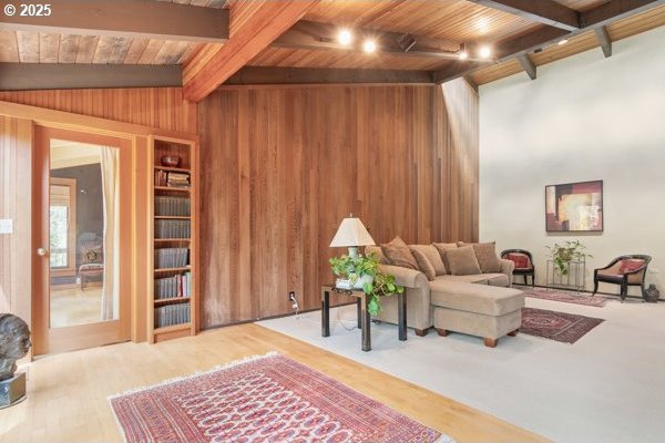 86595 N Modesto Dr, Eugene, OR 97402 - living room with wood walls, wood ceiling, and wood finished floors