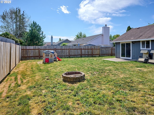 1201 Meadow Dr, Molalla, OR 97038 - fenced backyard featuring a fire pit and a patio