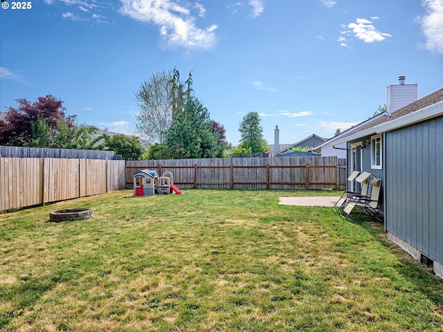 1201 Meadow Dr, Molalla, OR 97038 - fenced backyard featuring an outdoor fire pit and a patio