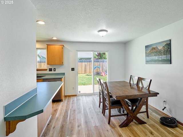 1201 Meadow Dr, Molalla, OR 97038 - dining area with light wood-style floors, a textured ceiling, and recessed lighting