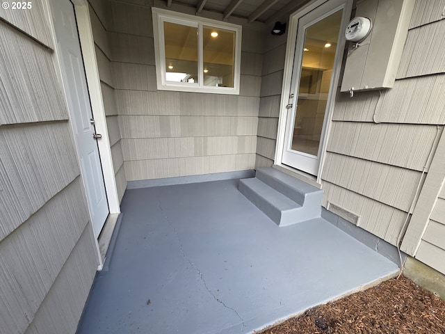 doorway to property featuring a patio area