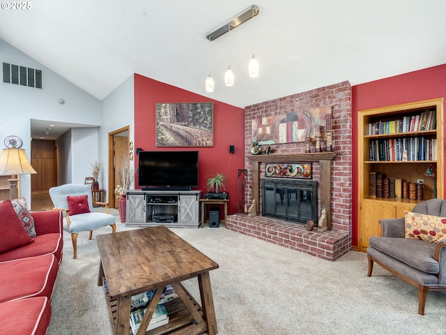 carpeted living room featuring visible vents, a fireplace, and vaulted ceiling