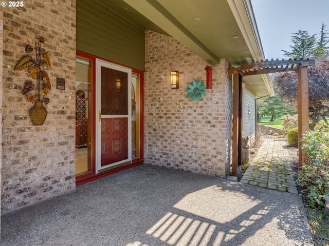 entrance to property with brick siding