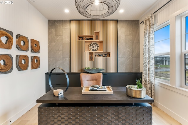 office space with light hardwood / wood-style flooring