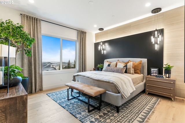 bedroom with wood-type flooring