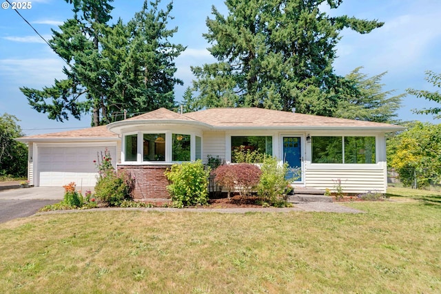 13015 E Burnside St, Portland, OR 97233 - view of front of home with a garage, concrete driveway, and a front yard