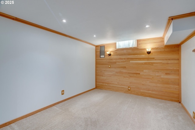 13015 E Burnside St, Portland, OR 97233 - finished below grade area featuring carpet, wooden walls, and recessed lighting