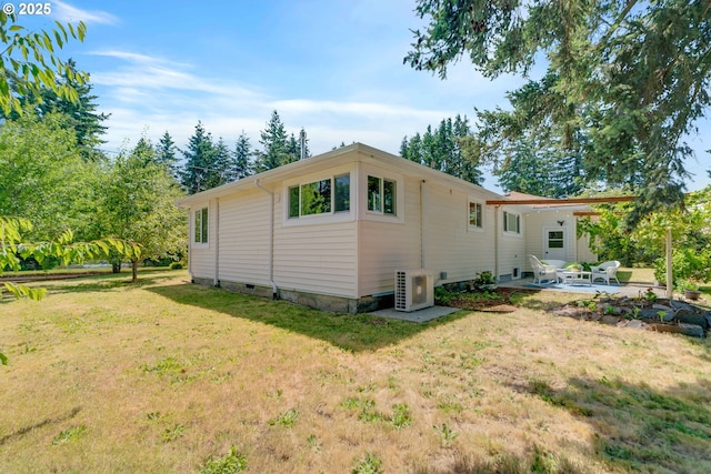 13015 E Burnside St, Portland, OR 97233 - view of side of property with a patio and a lawn