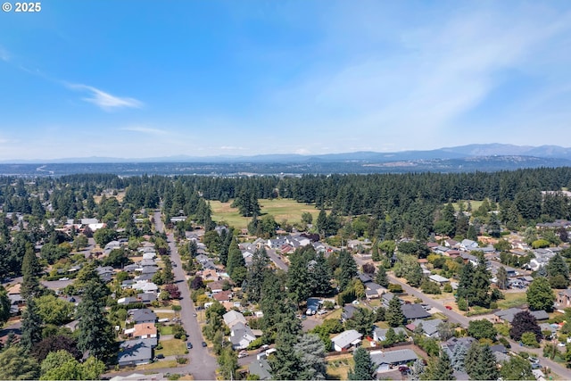 13015 E Burnside St, Portland, OR 97233 - aerial view of residential area featuring a forest and mountains