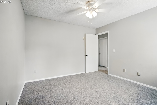 5594 SW Murray Blvd, Beaverton, OR 97005 - unfurnished bedroom featuring baseboards, ceiling fan, carpet flooring, and a textured ceiling