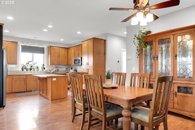 3730 Hemlock Pl SE, Albany, OR 97322 - dining room with light wood-style floors, ceiling fan, and recessed lighting