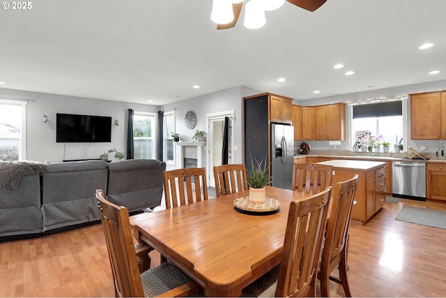3730 Hemlock Pl SE, Albany, OR 97322 - dining space with light wood finished floors, a ceiling fan, and recessed lighting