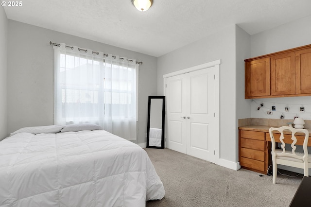 3730 Hemlock Pl SE, Albany, OR 97322 - bedroom with light colored carpet, a closet, and baseboards