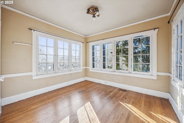 unfurnished sunroom featuring a wealth of natural light