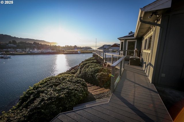 exterior space with a water view