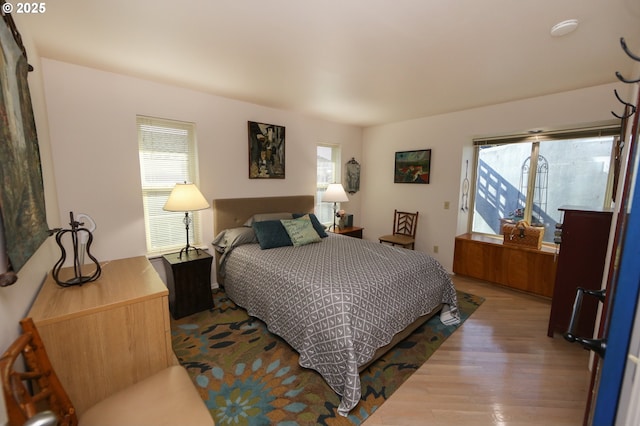 bedroom featuring wood-type flooring