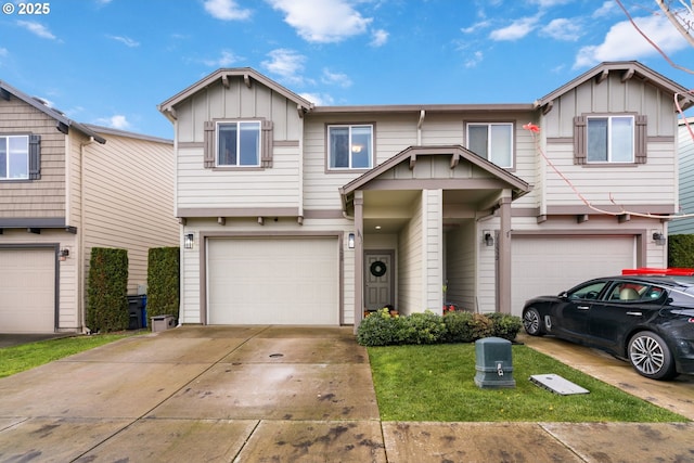 townhome / multi-family property featuring a garage