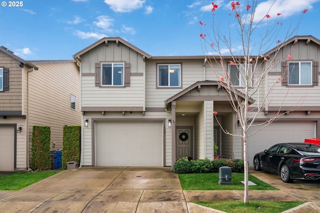 townhome / multi-family property featuring a garage