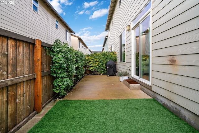 view of yard with a patio area