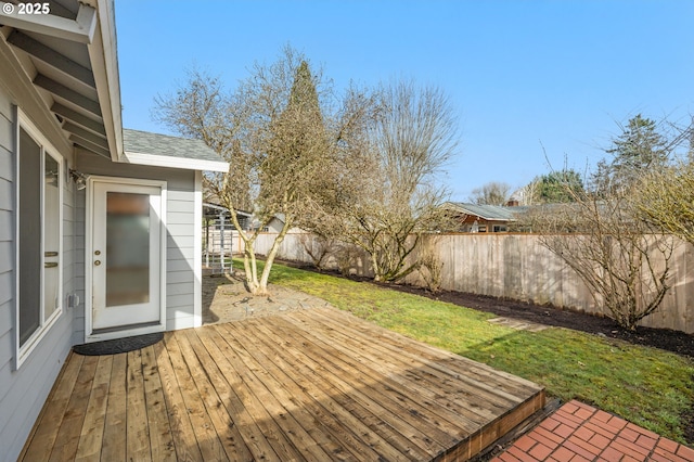 deck featuring a lawn