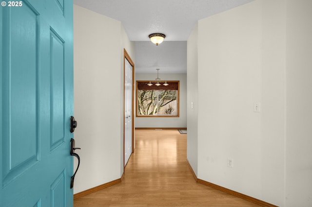 hall featuring light hardwood / wood-style floors