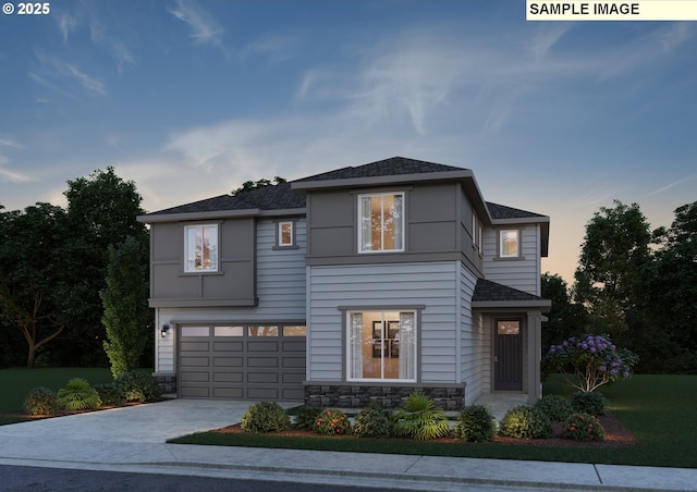 366 S 87th Ave, Ridgefield, WA 98642 - view of front of home featuring concrete driveway, an attached garage, a shingled roof, and stone siding