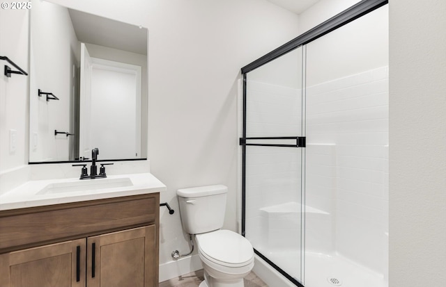 366 S 87th Ave, Ridgefield, WA 98642 - full bathroom with toilet, a stall shower, vanity, and baseboards