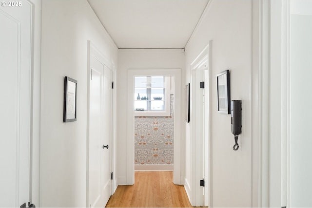 2829 SE Belmont St Unit 205, Portland, OR 97214 - hallway featuring light wood-style flooring and baseboards