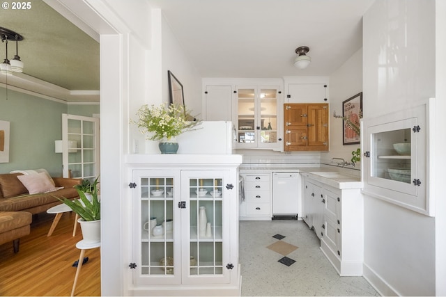 2829 SE Belmont St Unit 205, Portland, OR 97214 - bar area with white dishwasher and light floors