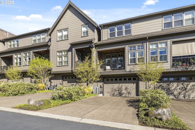 10135 SW Morrison St, Portland, OR 97225 - townhome / multi-family property with an attached garage, driveway, and cooling unit