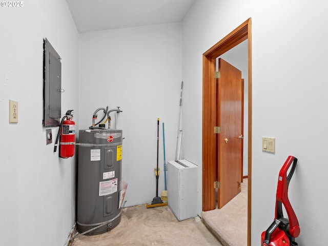 utility room with electric water heater and electric panel