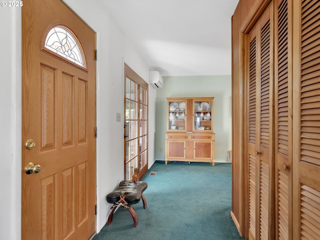 450 Pleasant Ave, Astoria, OR 97103 - entryway featuring a wall mounted air conditioner, dark carpet, and plenty of natural light