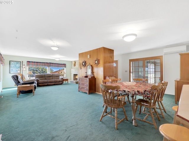 450 Pleasant Ave, Astoria, OR 97103 - carpeted dining space featuring an AC wall unit and wooden walls