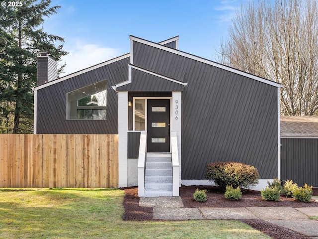 view of outbuilding with a yard