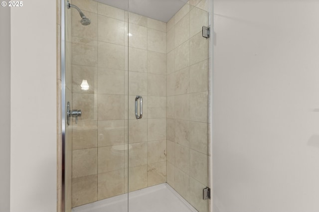 full bath featuring a stall shower