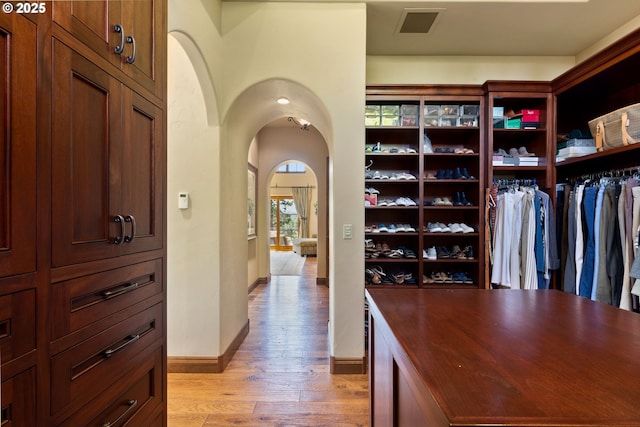 16465 Suntree Ln, Sisters, OR 97759 - spacious closet with arched walkways and light wood finished floors