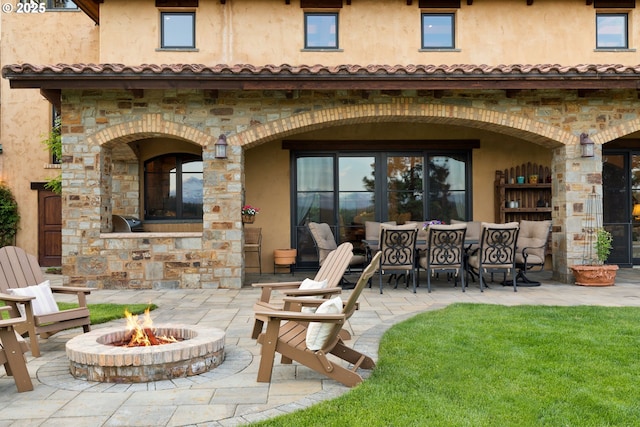 16465 Suntree Ln, Sisters, OR 97759 - view of patio / terrace with a fire pit