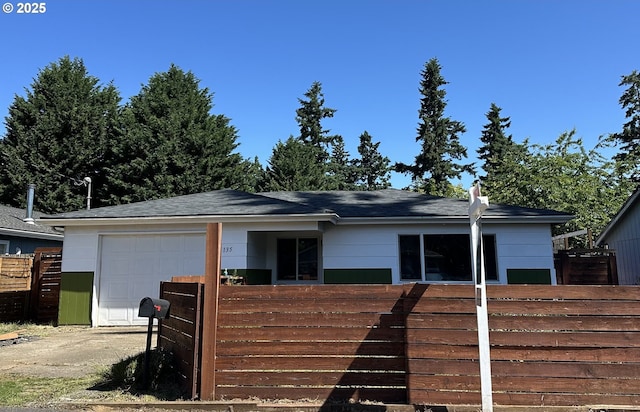 6135 SE Lambert St, Portland, OR 97206 - single story home featuring a garage and roof with shingles