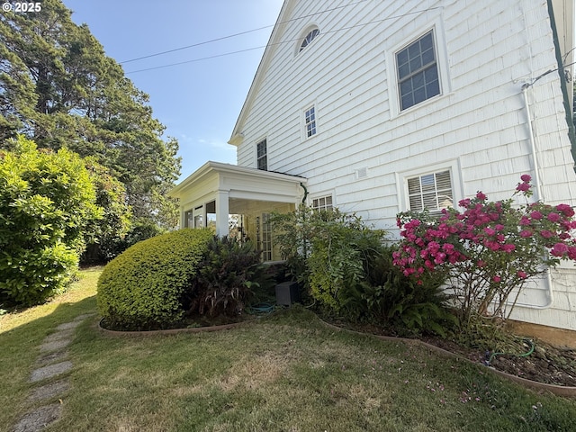 880 E 2nd St, Coquille, OR 97423 - view of home's exterior with a yard
