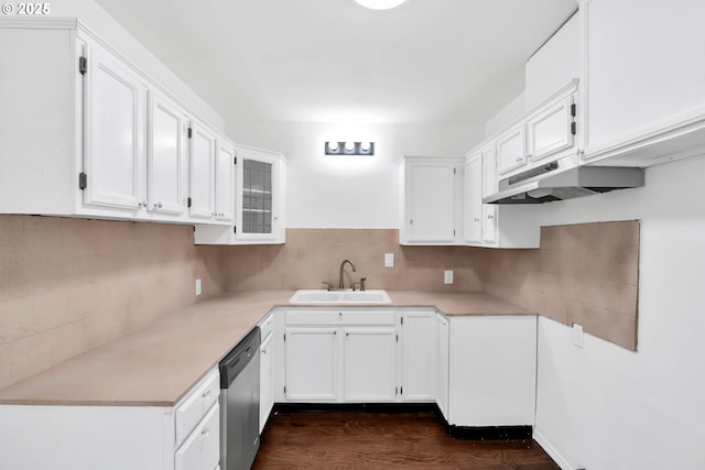 kitchen featuring a sink, white cabinetry, under cabinet range hood, and dishwasher
