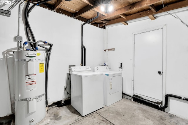 clothes washing area with secured water heater, laundry area, and washing machine and clothes dryer