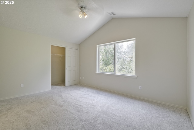 1115 NE 86th Way, Hillsboro, OR 97006 - unfurnished bedroom with vaulted ceiling, carpet, a closet, and baseboards