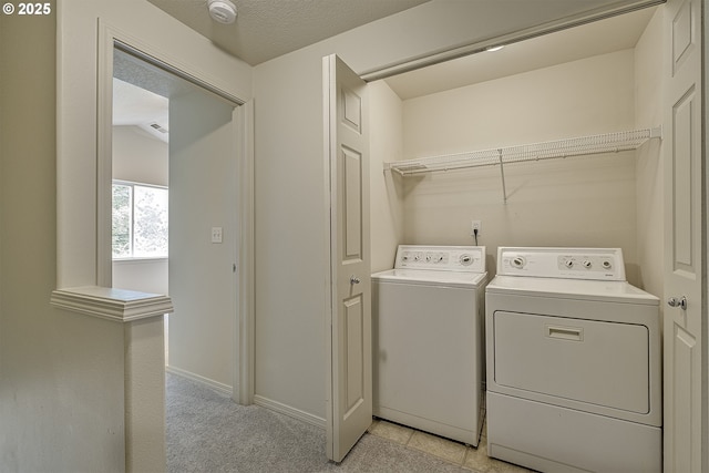 1115 NE 86th Way, Hillsboro, OR 97006 - washroom featuring washer and dryer, light colored carpet, and baseboards