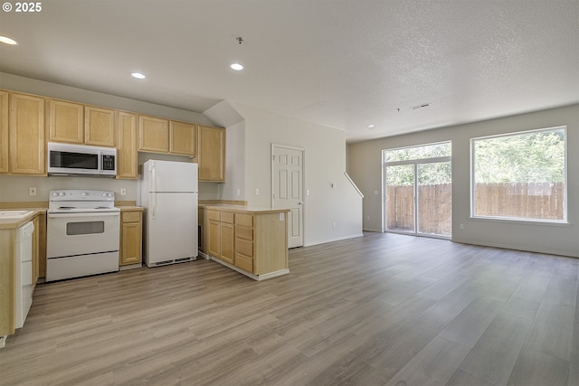 1115 NE 86th Way, Hillsboro, OR 97006 - kitchen with white appliances, light countertops, light brown cabinets, light wood-style flooring, and recessed lighting